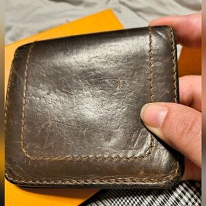 Louis Vuitton Two Folded Wallet made from Utah leather.